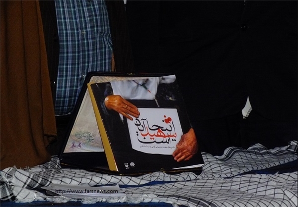 کتاب عکس " اینجا شهید آباد است" در مسجد این روستا به نمایش درآمد